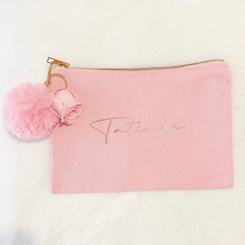 Cosmetic Bag crafted from canvas with Pom Pom accent